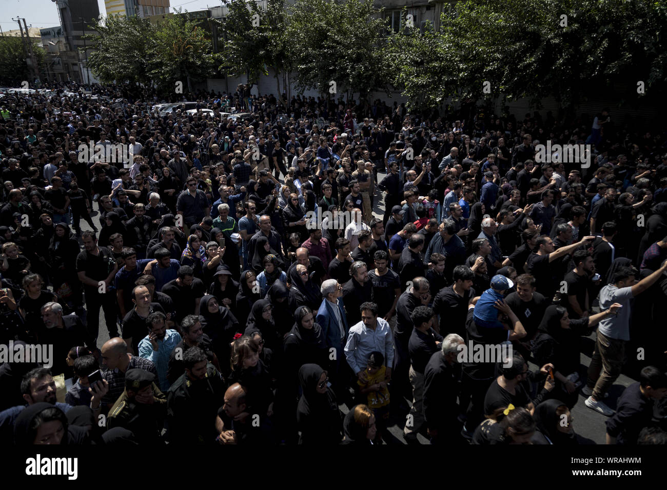 Tehran, Tehran, Iran. 10th Sep, 2019. People attend as Iranians perform at the Ashura ceremonies in Tehran, Iran. The Ashura day commemorates the death anniversary of the third Shiite Imam Hussein, who was the grandson of Muslim Prophet Muhammed. Ashura is the peak of ten days of mourning when Shiite Muslims mourn the killing of Imam Hussein whose shrine is in Karbala in southern Iraq. Credit: Rouzbeh Fouladi/ZUMA Wire/Alamy Live News Stock Photo