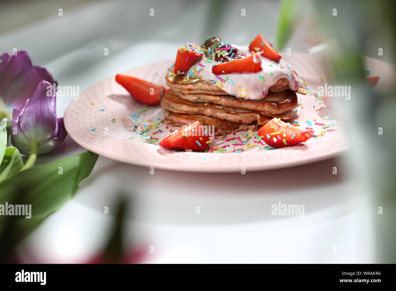 Pink Pancakes With Strawberries Cottage Cheese And Colorful Sugar