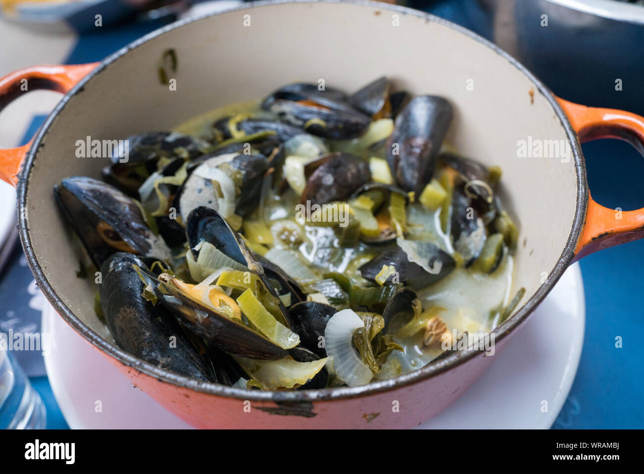 Horizontal view of traditional mussel and french fries dish called "Moules et Frites Stock Photo