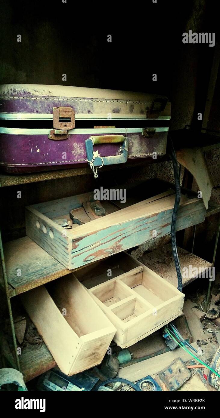 Suitcase And Boxes On Abandoned Shelves Stock Photo Alamy