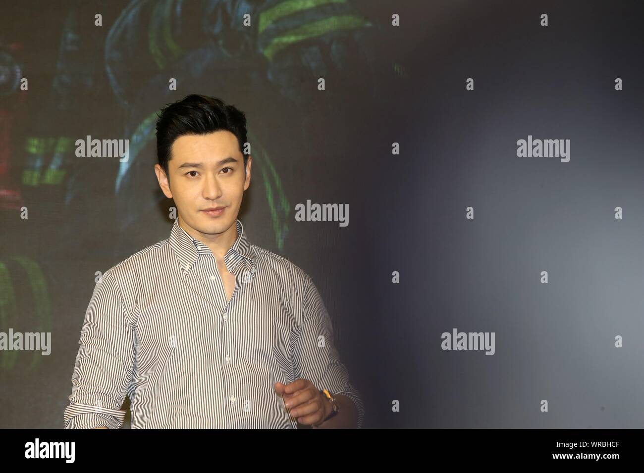 Chinese actor Huang Xiaoming attends a promotional event for his new film 'The Bravest' at a shopping mall in Xi'an City, northwest China's Shaanxi Pr Stock Photo