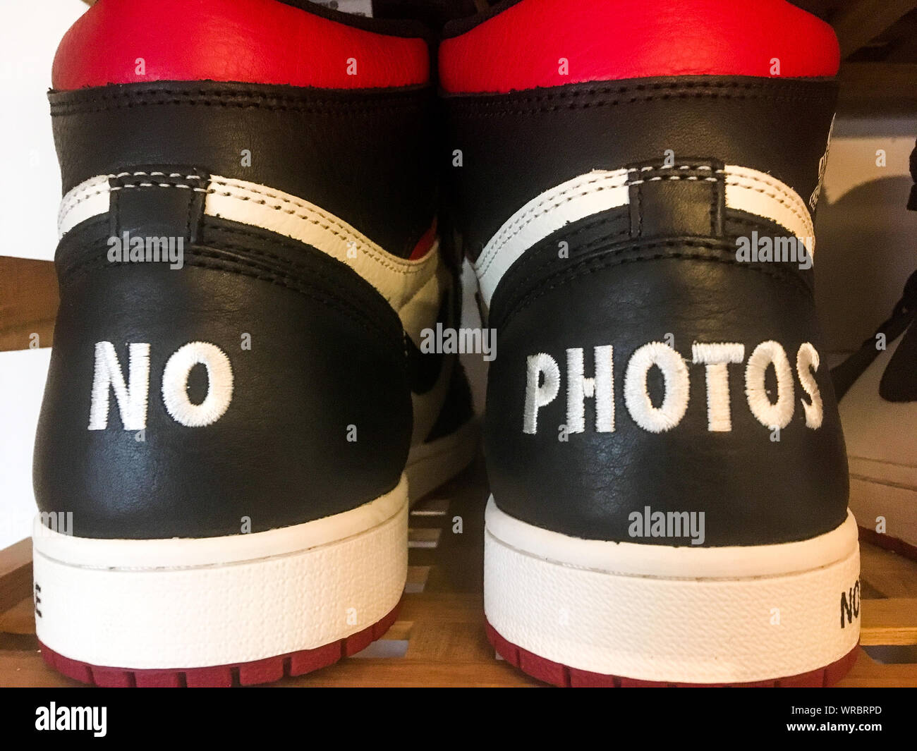 A pair of Jordan Air sneakers decorated with the words: No Photo, Paris,  France Stock Photo - Alamy