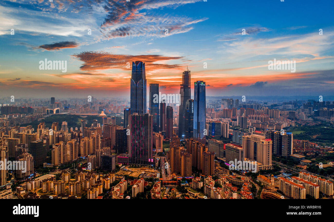 A cityscape at sunset of ASEAN Business District with clusters of skyscrapers, high-rise buildings in Nanning City, south China's Guangxi Zhuang Auton Stock Photo