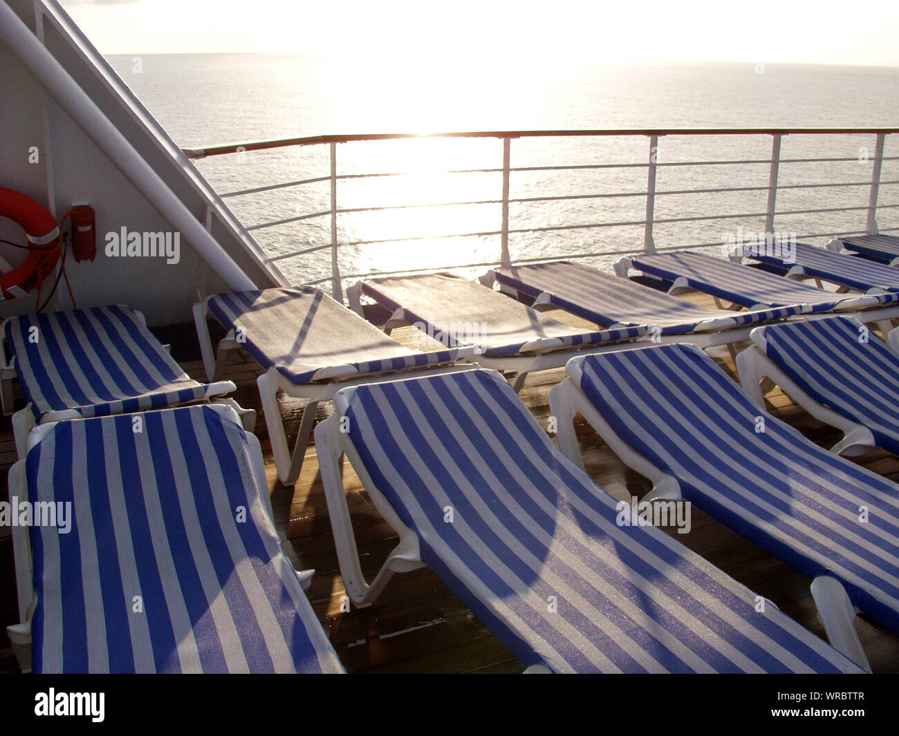 Lounge Chairs On Boat Deck In Sea Stock Photo Alamy