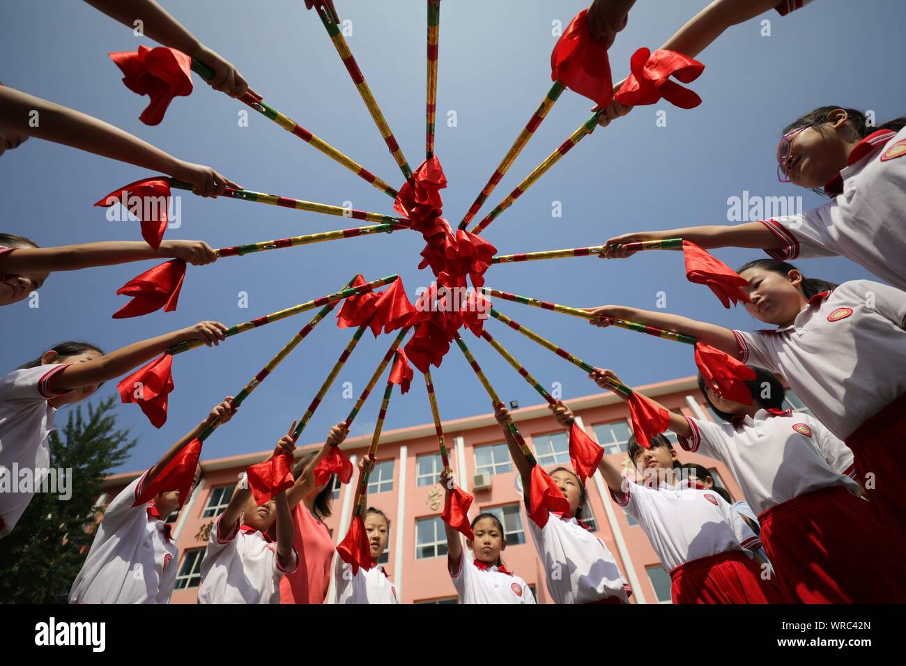 Young Chinese Students Practice Bawangbian Dance Or Rattle Stick Dance At A Primary School In Chengde City North China S Hebei Province August 8th Stock Photo Alamy