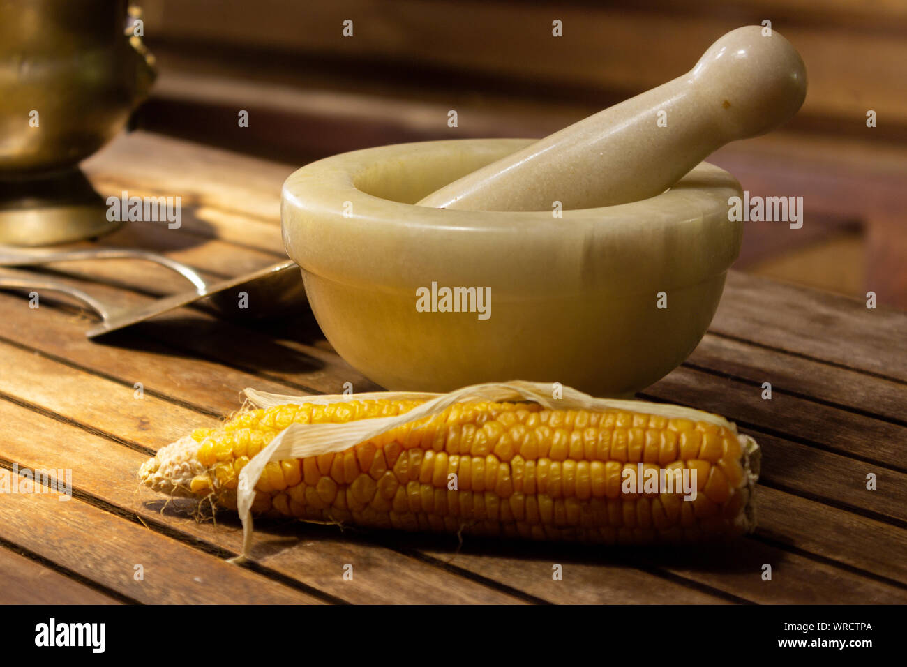 Traditional stone corn grinder hires stock photography and images Alamy
