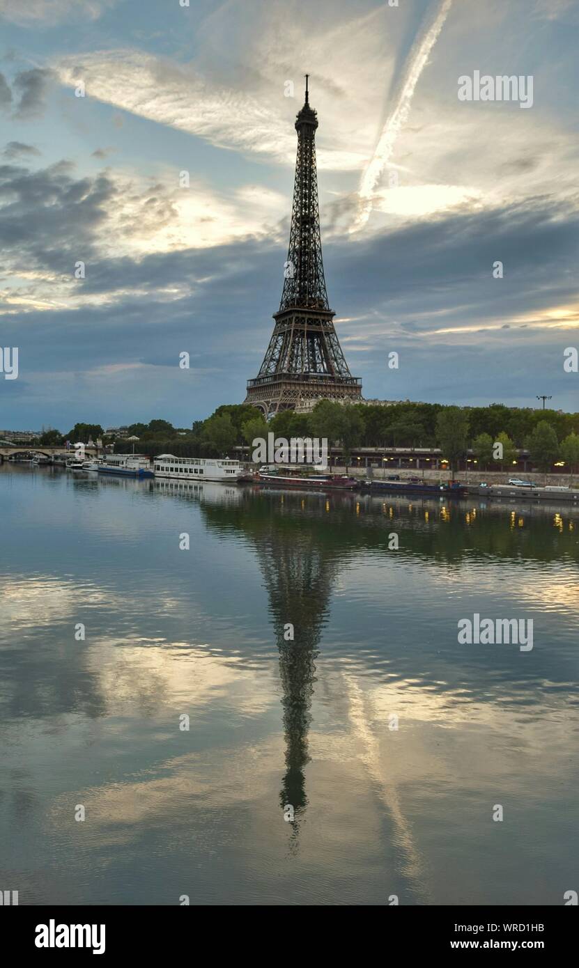Reflection Of Tower In Water Stock Photo