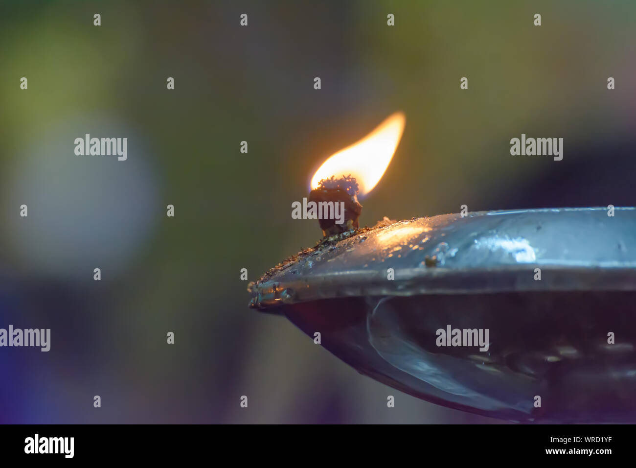 Light in the oil lamps. It's used in Buddhism Stock Photo Alamy