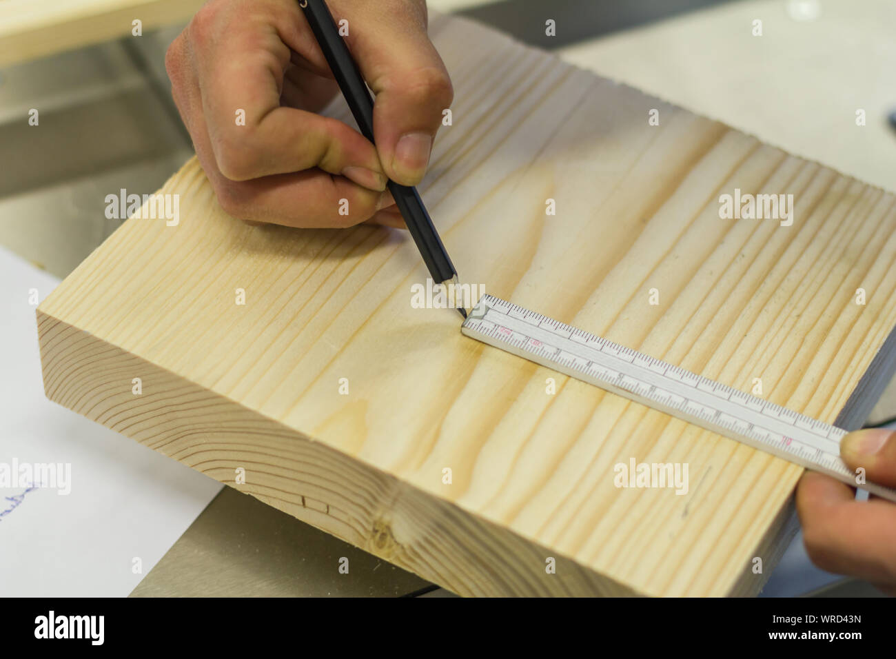 Female carpenter carpenter with scale meter stick. Ruler and pen render