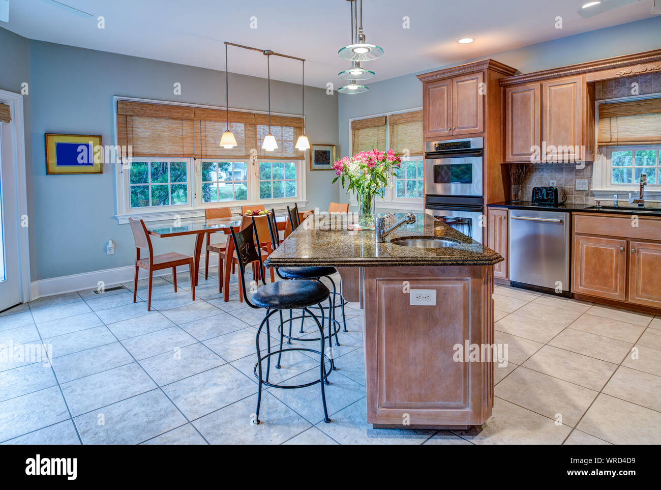 Image showcasing Open concept kitchen and dining room apartment Stock Photo - Alamy