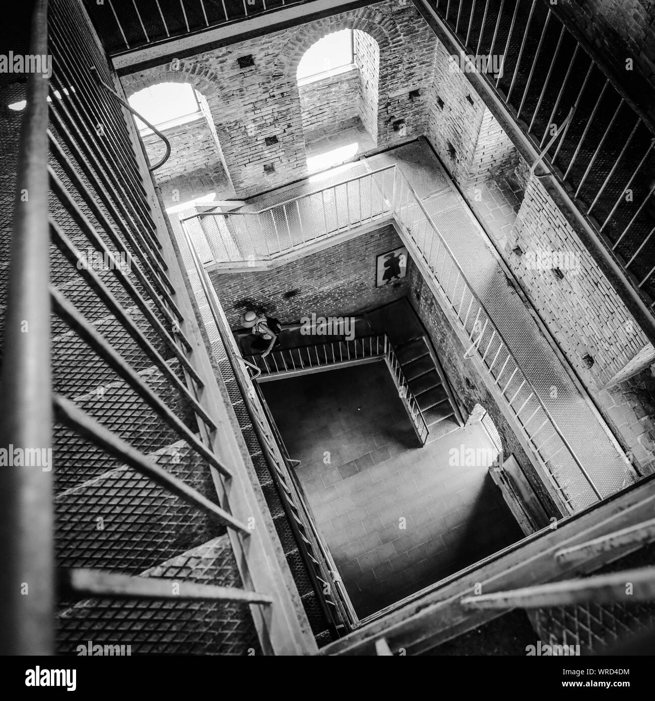 Woman walking up the steps hi-res stock photography and images - Alamy