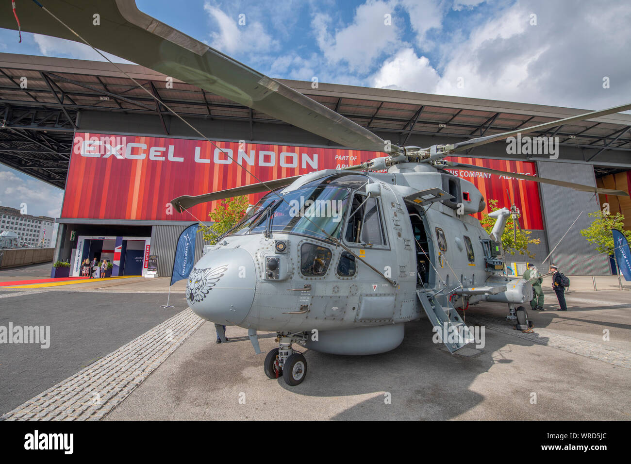 ExCel, London, UK. 10th September 2019. Defence & Security Equipment International (DSEI) event opens from 10th-13th September with over 1600 worldwide exhibitors and more than 35,000 attendees expected. Image: Royal Navy Merlin submarine hunter helicopter at DSEI eastn entrance. Credit: Malcolm Park/Alamy Live News. Stock Photo