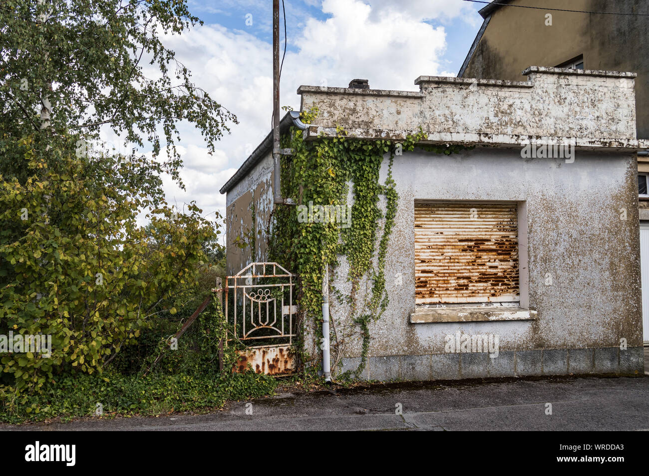 Small Abandoned House With A Rusty Gate Gate In The Small Town Of Virton In The Province Of Luxembourg In Belgium Stock Photo Alamy