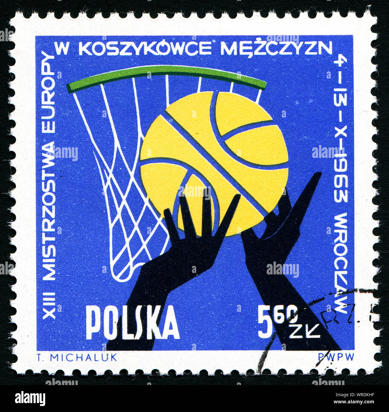 Post stamp printed in Poland showing  ball, hands and players, 13th European men basketball championship Wroclaw, circa 1963 Stock Photo