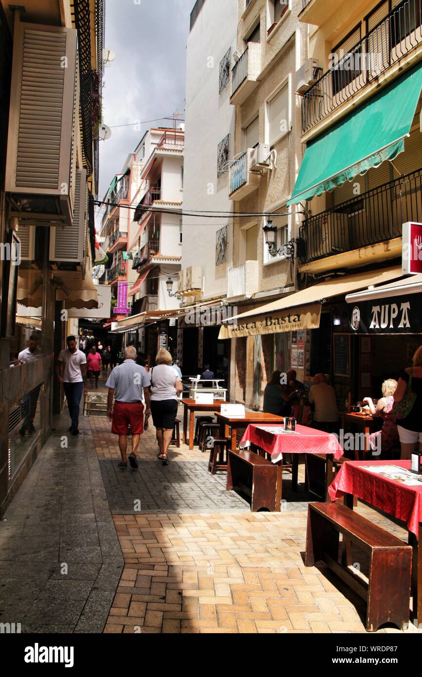 Benidorm, Alicante, Spain- September 7, 2019: Bar of typical spanish food full of people in the old town of Benidorm Stock Photo