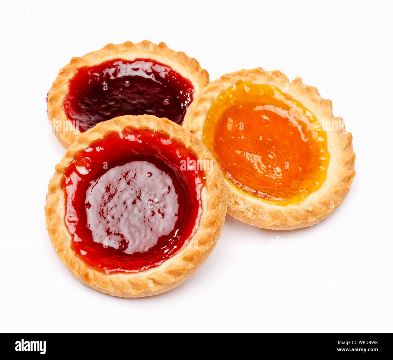 Three traditional British jam tarts on a white background Stock Photo