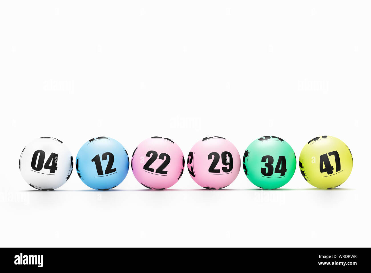 Six numbered balls multi coloured Lotto balls, Lottery or Bingo balls in a row on a white background Stock Photo