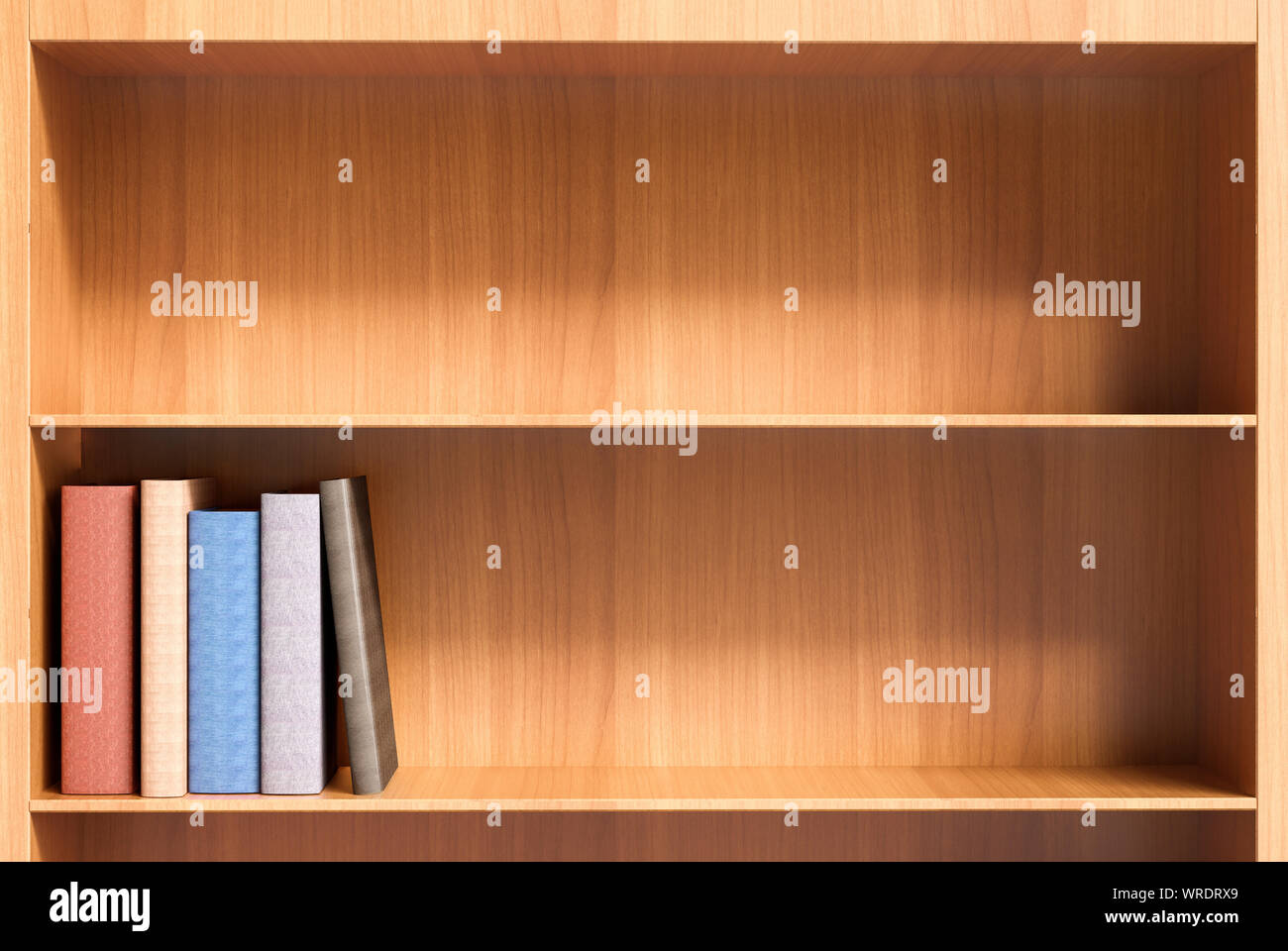 Two shelves (one empty) of a wooden bookcase with a few hardback books with blank spines Stock Photo