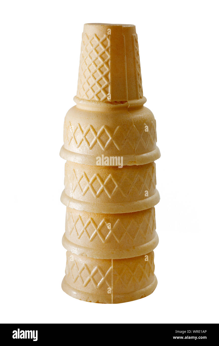 Stack of four empty waffle ice cream cones upside down, isolated on white background Stock Photo