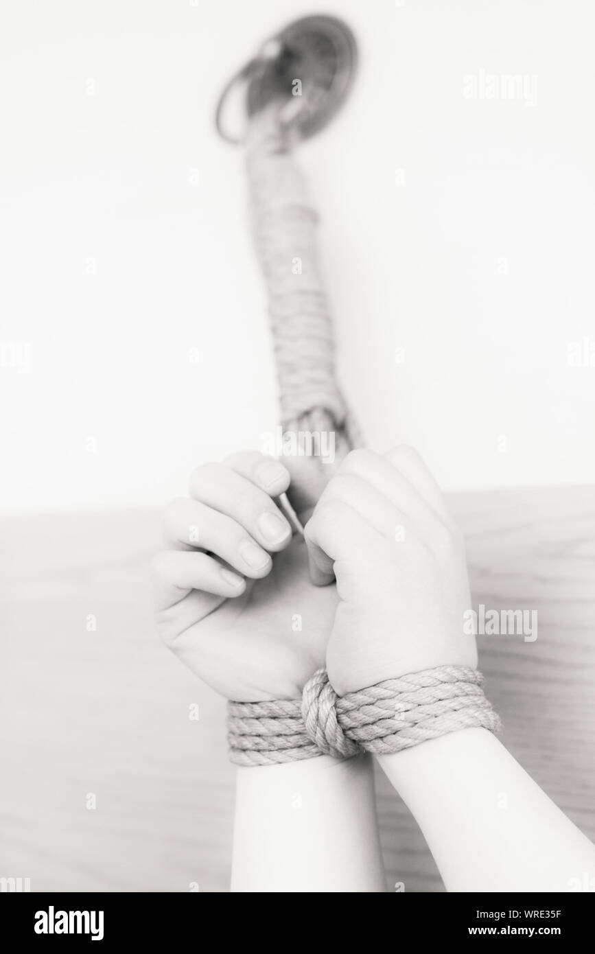 Women hands tied rope hires stock photography and images Alamy