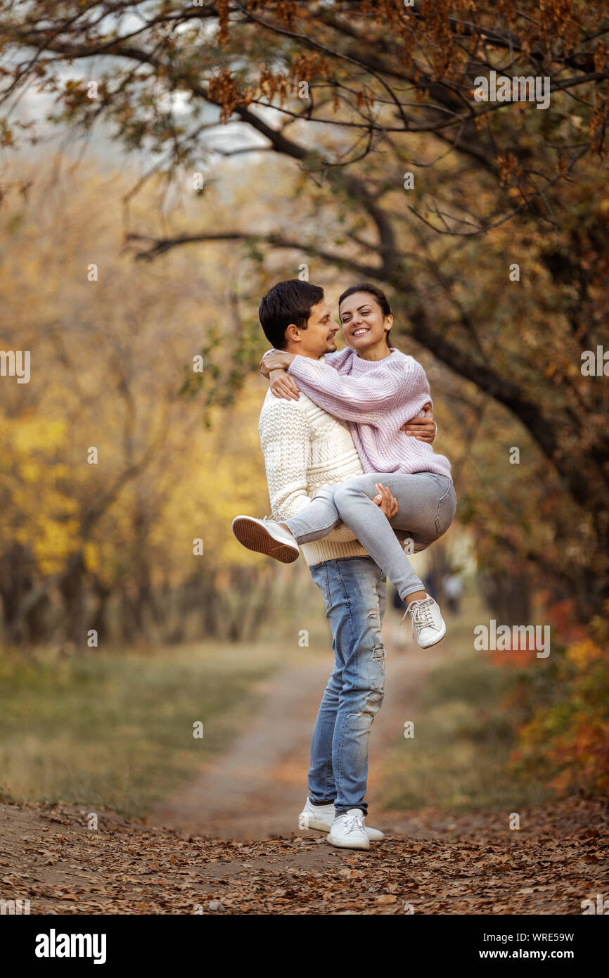 Couple in love having fun in beautiful autumn park. happy moments