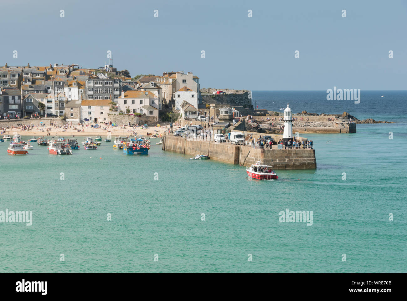 Calm waters at high tide, St Ives, Cornwall in high summer. Stock Photo