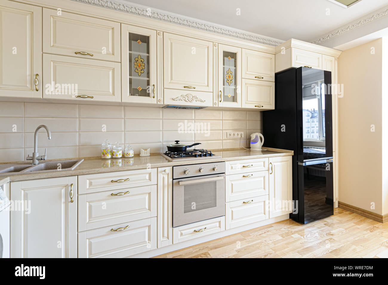 Modern white Kitchen Counter and Kitchen Equipment in Luxurious Apartment.  small kitchen counter ideas in the residential Stock Photo - Alamy