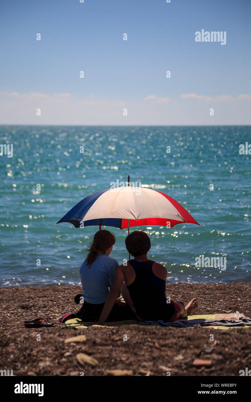 Lovers on a beach hires stock photography and images Alamy