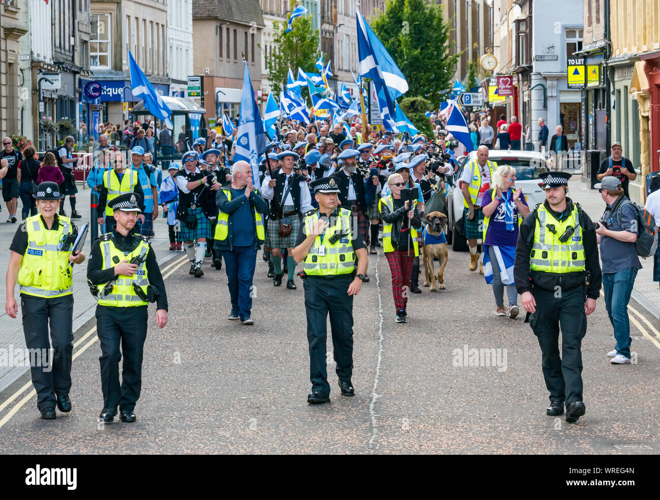 All Under One Banner Independence (AUOB) rally, Perth,  Scotland, UK. Line of police in front of the Scottish independence supporters Stock Photo