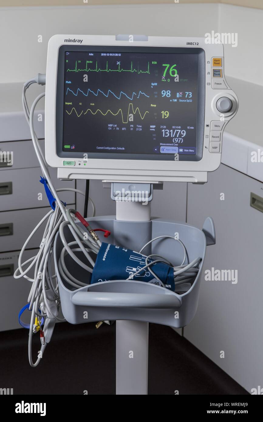 Mindray Imec 12 sub acute care medical  patient monitoring device showing blood pressure and pulse heart rate. Stock Photo