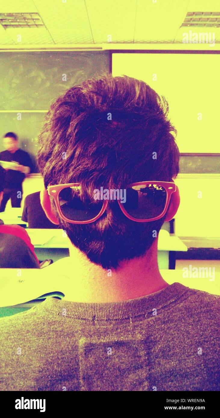 High School Student With Sunglasses In Classroom Stock Photo Alamy