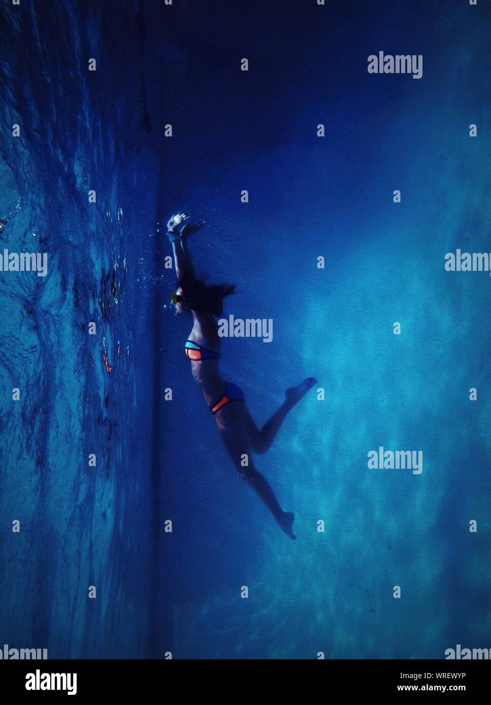 Woman swimming in water hi-res stock photography and images - Alamy