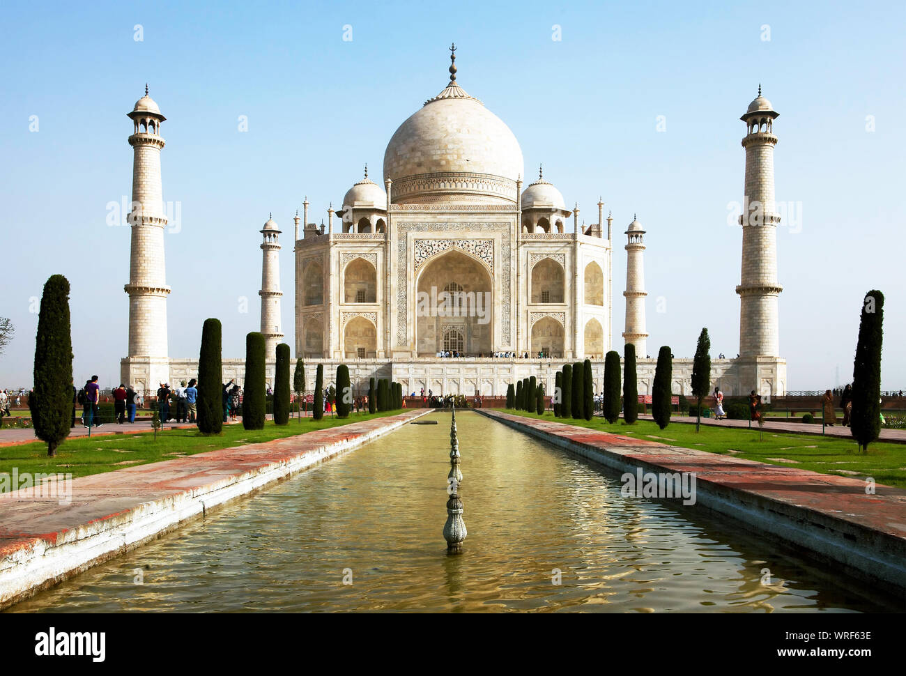 Low Angle View Of Taj Mahal In Front Of Reflecting Pool Against Clear Sky Stock Photo