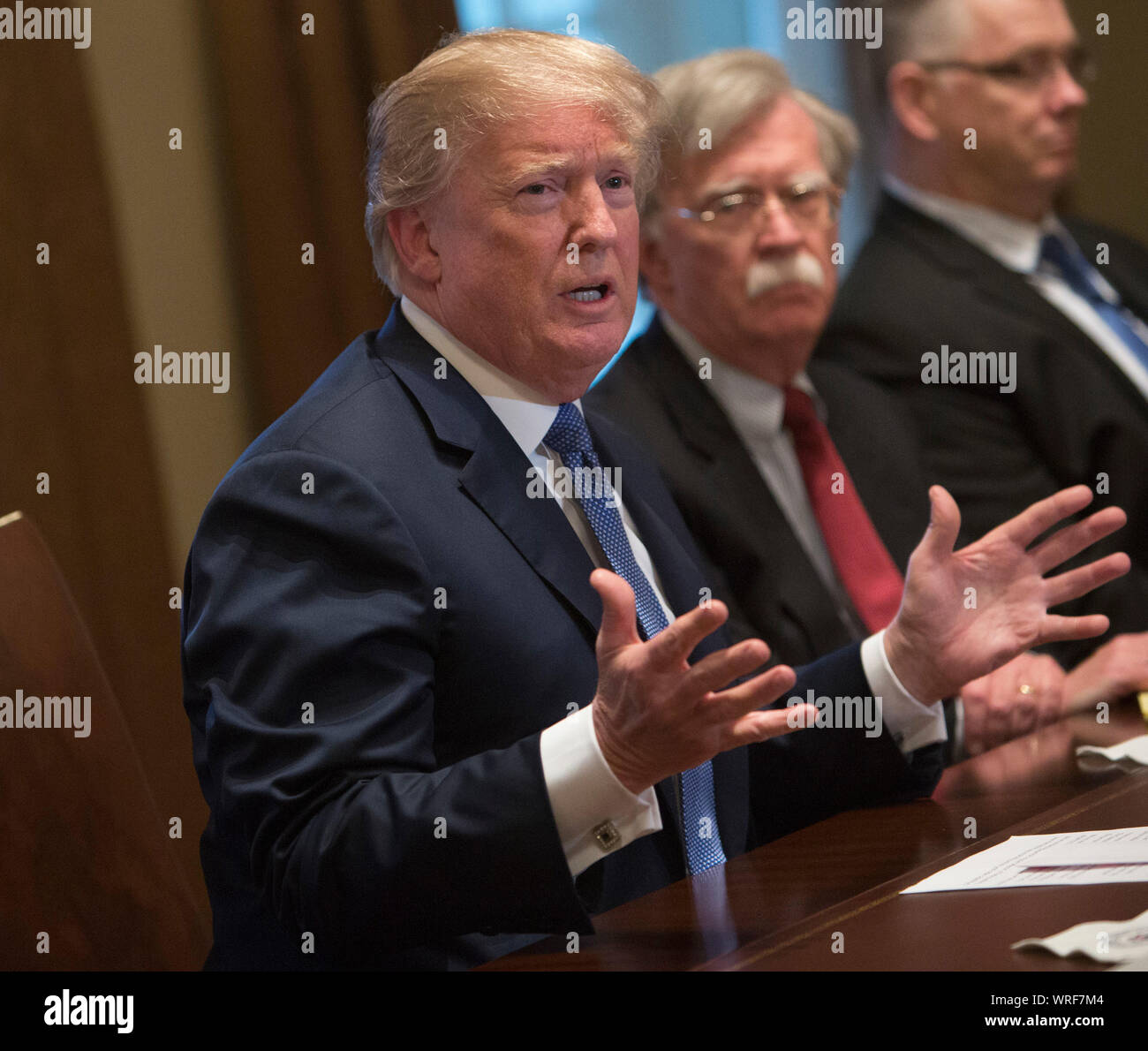 ***FILE PHOTO*** Donald Trump Fires National Security Advisor John Bolton***.  United States President Donald J. Trump makes statements on the ongoing investigation of  election meddling and on the current situation in Syria during a meeting with senior military leadership at The White House in Washington, DC, March 9, 2018. Seated next to Trump is National Security Advisor John Bolton.  Credit: Chris Kleponis / CNP /MediaPunch Stock Photo