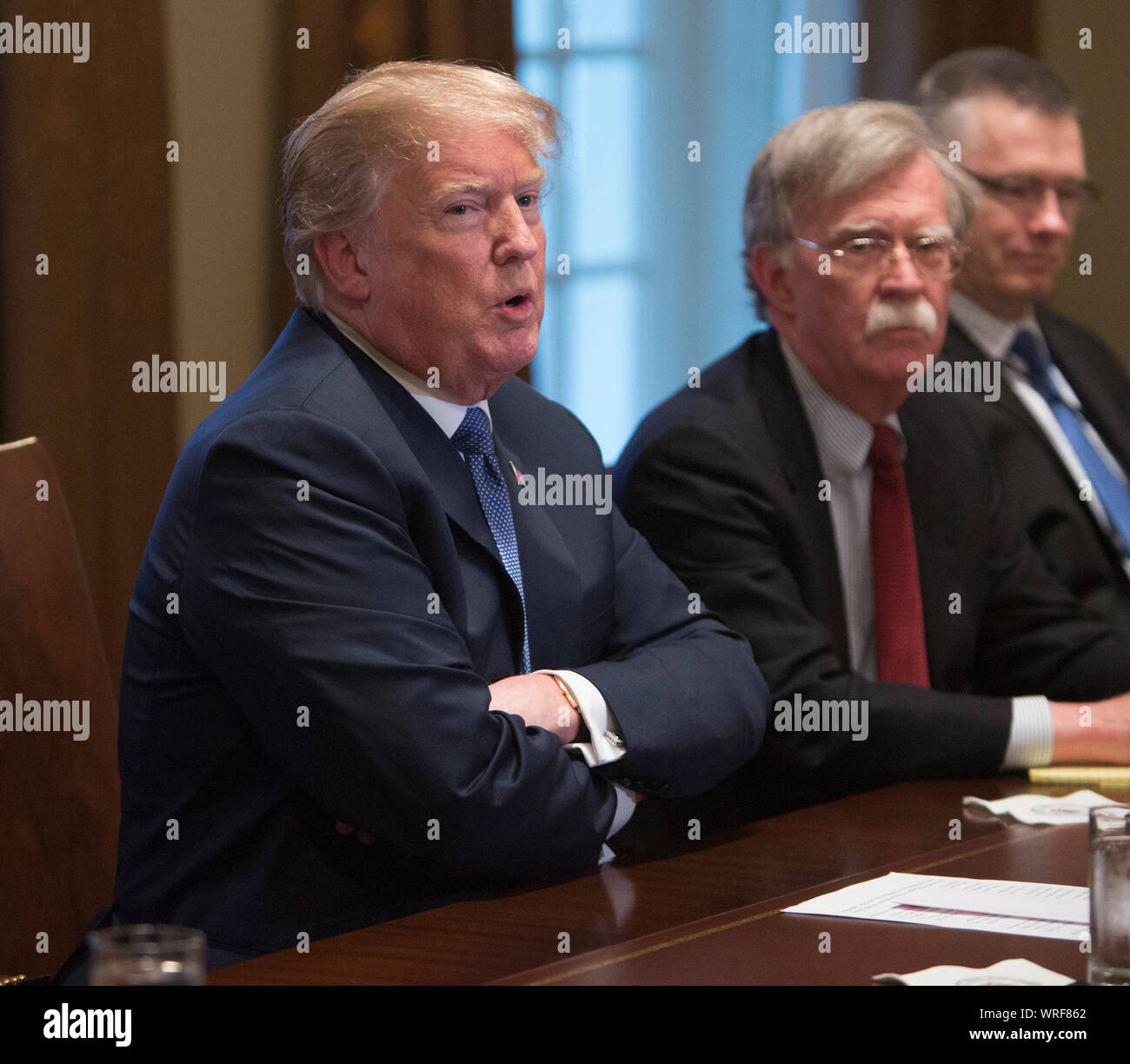 ***FILE PHOTO*** Donald Trump Fires National Security Advisor John Bolton***. United States President Donald J. Trump makes statements on the ongoing investigation of election meddling and on the current situation in Syria during a meeting with senior military leadership at The White House in Washington, DC, March 9, 2018. Seated next to Trump is National Security Advisor John Bolton. Credit: Chris Kleponis/CNP /MediaPunch Stock Photo