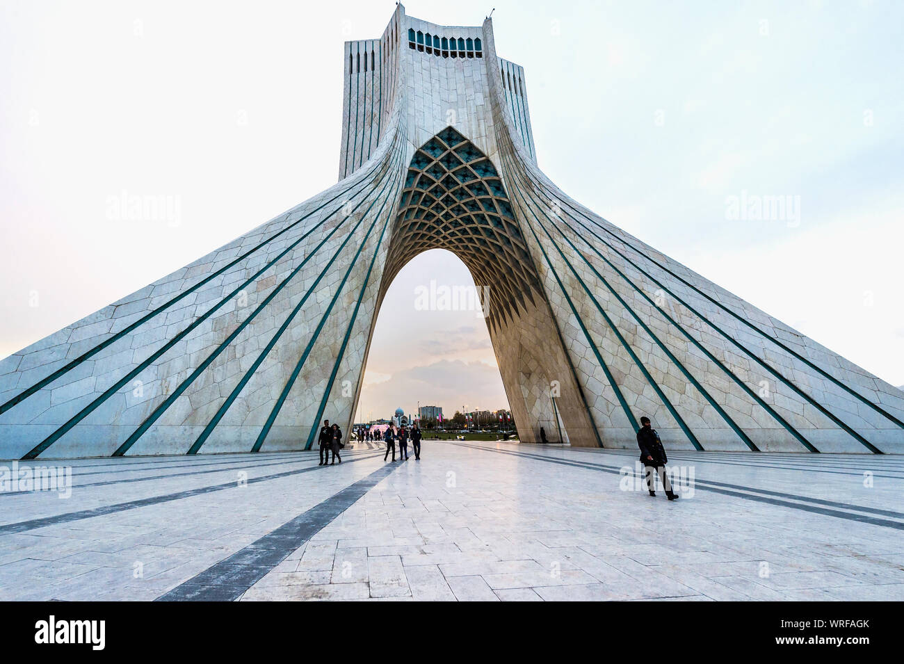 Azadi Tower or Borj-e Azadi tower or Freedom Monument formerly known as Shahyad Tower and cultural complex at sunset, Tehran, Islamic Republic of Iran Stock Photo