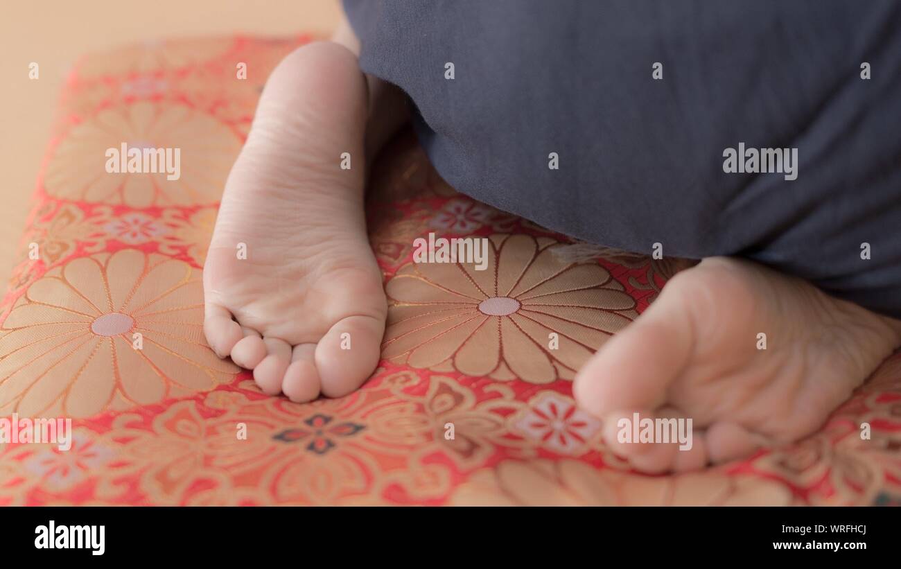 Girl kneeling on bed hi-res stock photography and images - Alamy