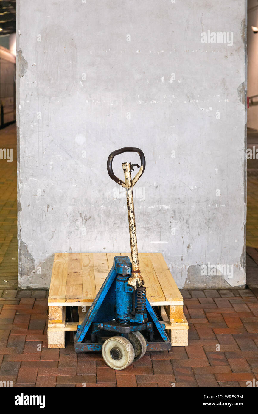 Pallets at Hand Jack Forklift in Warehouse Stock Photo Alamy