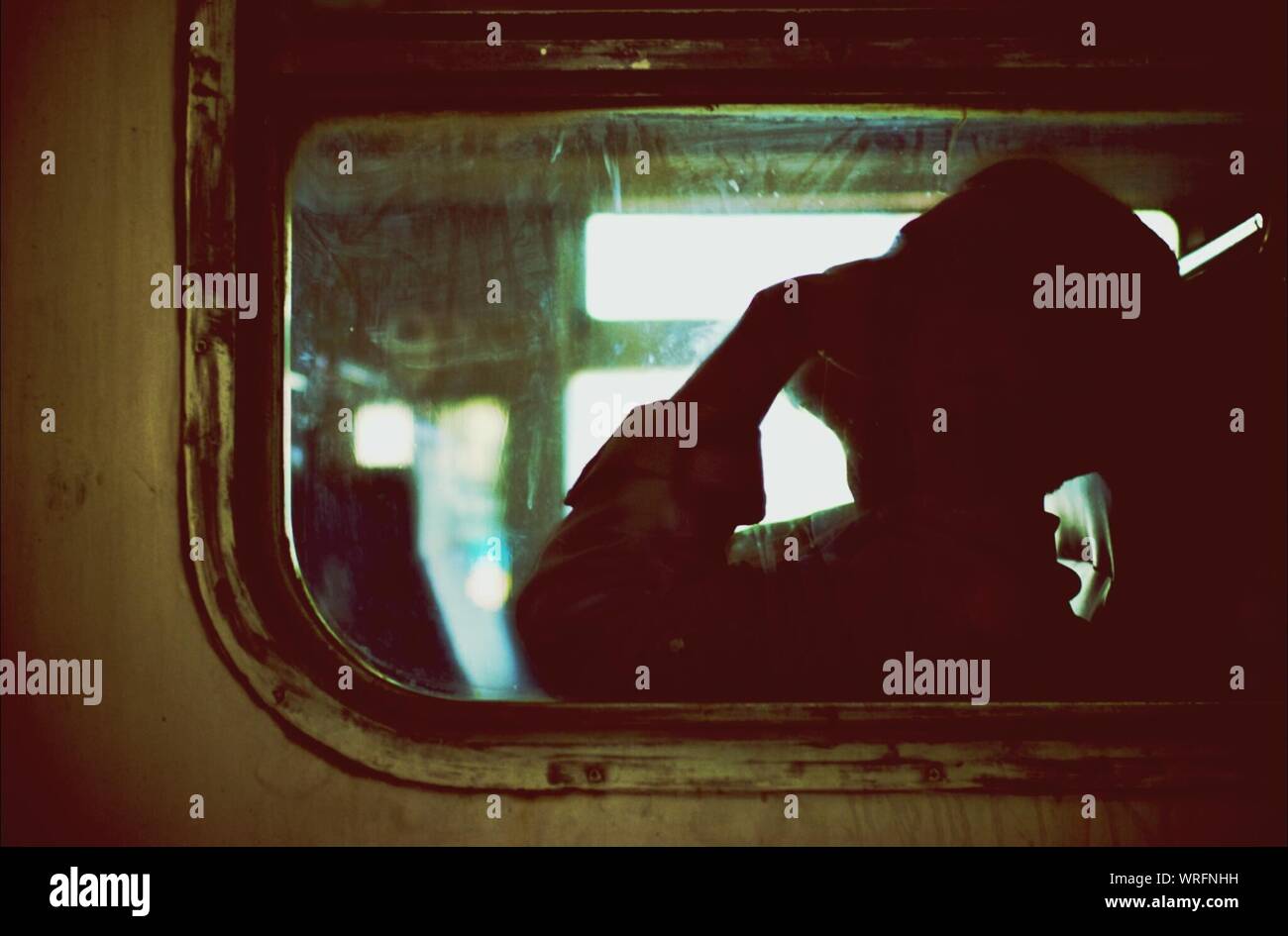 Person sleeping on train hi-res stock photography and images - Alamy