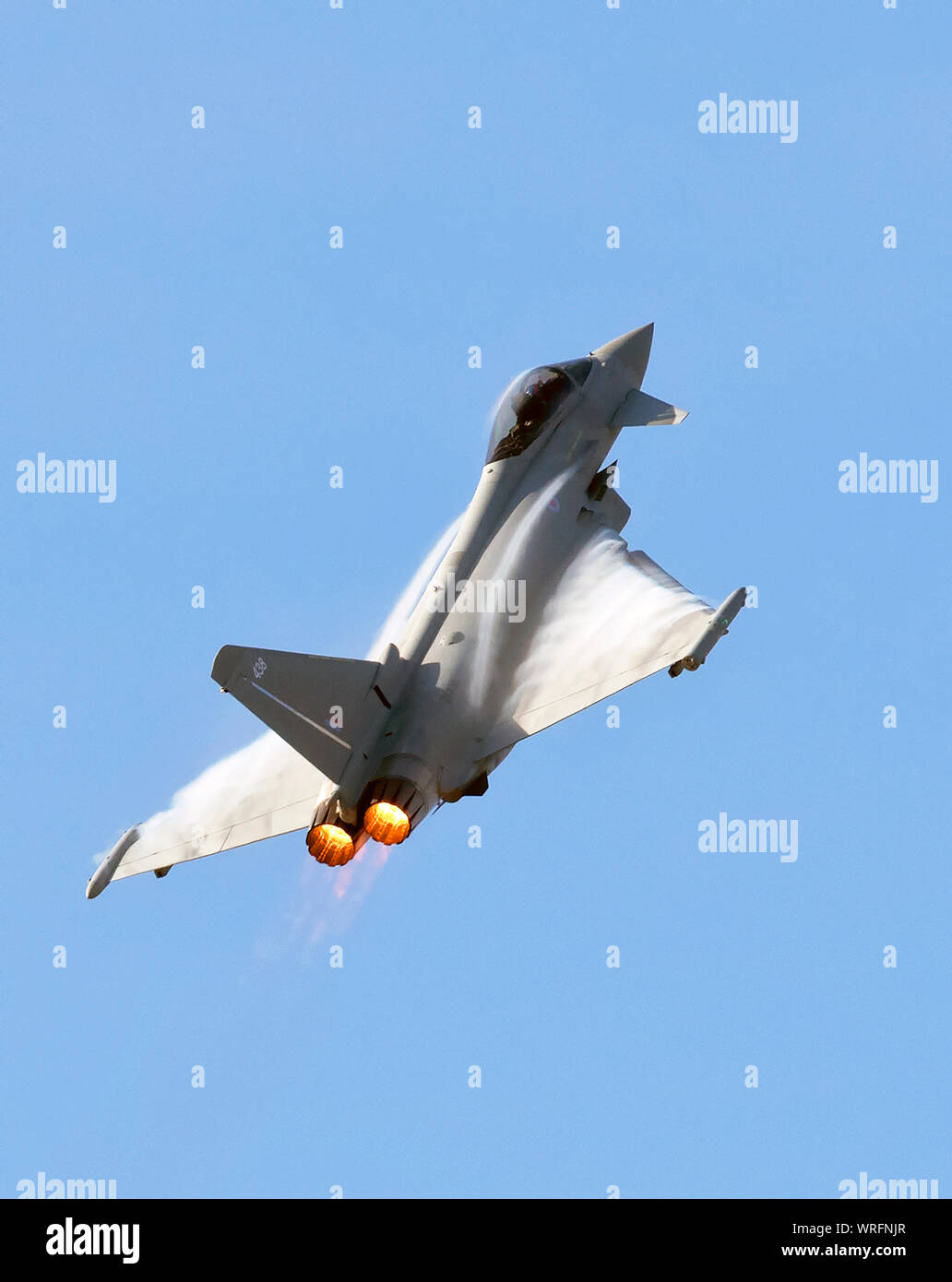 RAF Typhoon showing afterburner and jet stream as it performs at the 2019 Southport Air Show, Merseyside, UK Stock Photo
