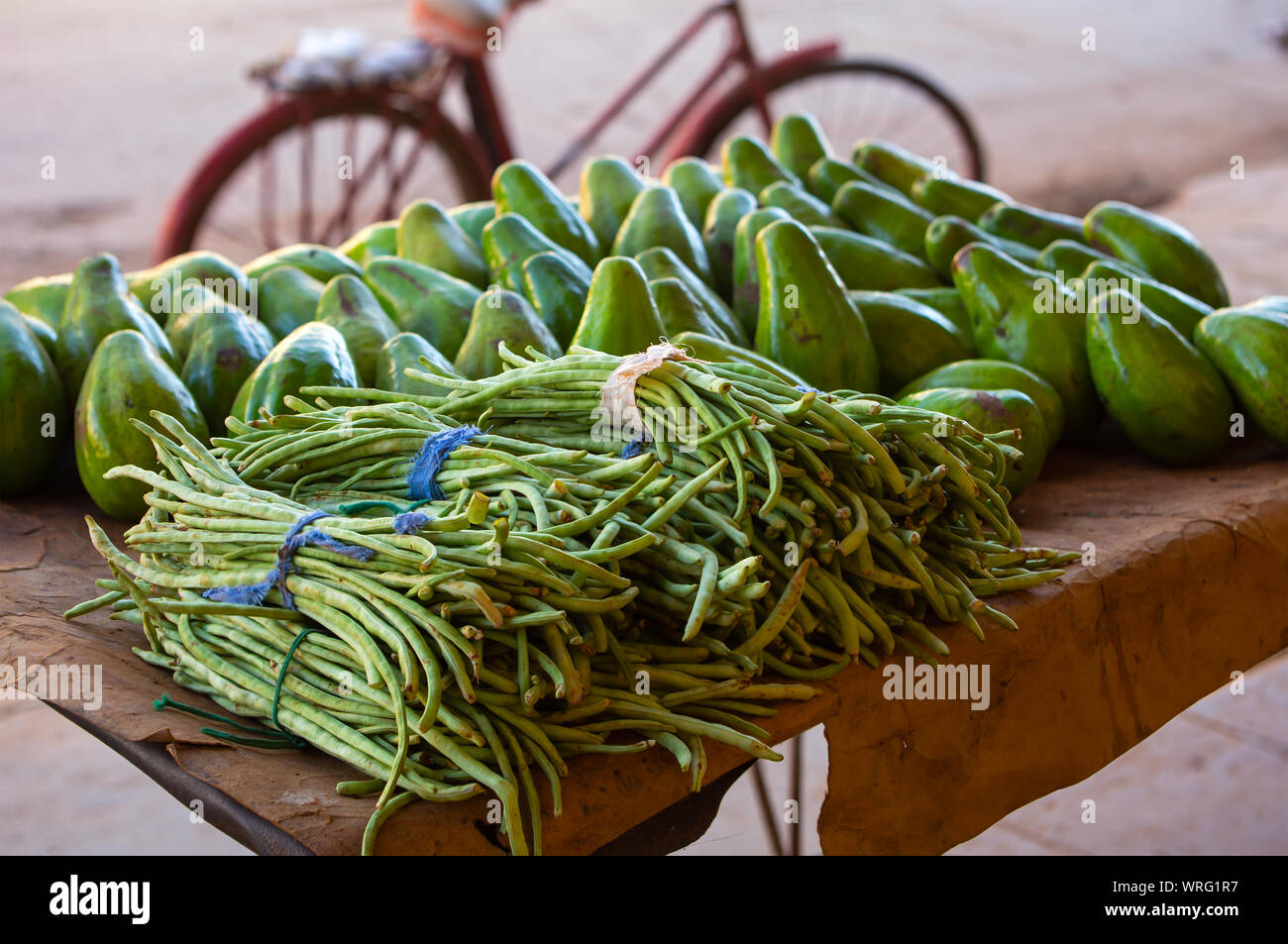 Fresh avocados and green beans at a roadside stand in Cuba Stock Photo