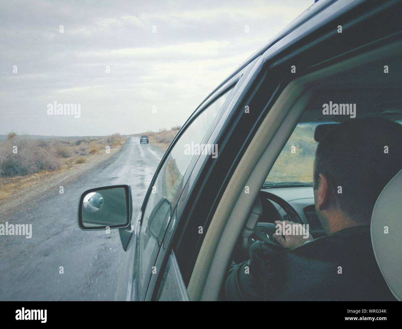 Side view car driving road hi-res stock photography and images - Alamy