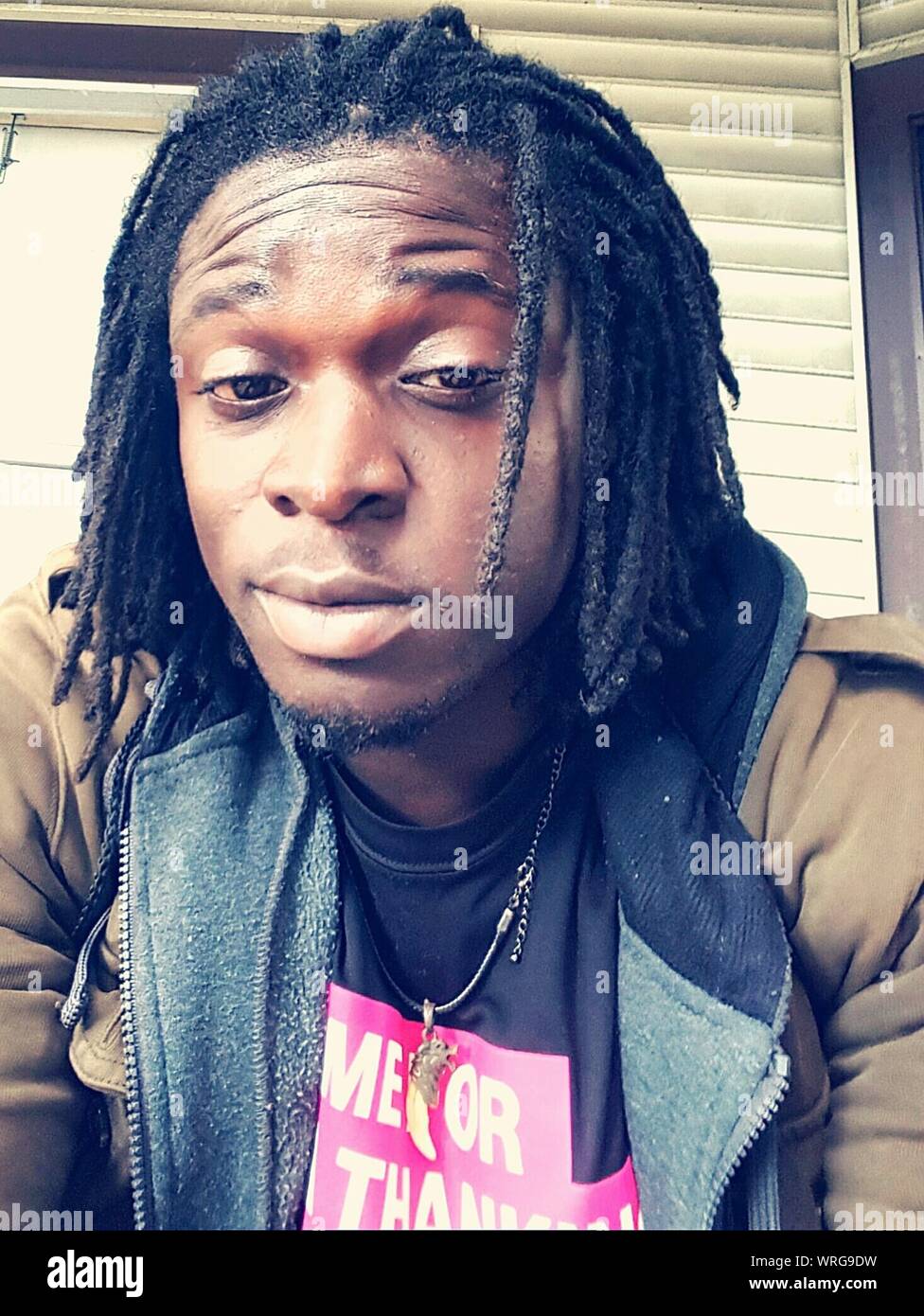Young black man with dreadlocks hi-res stock photography and images - Alamy