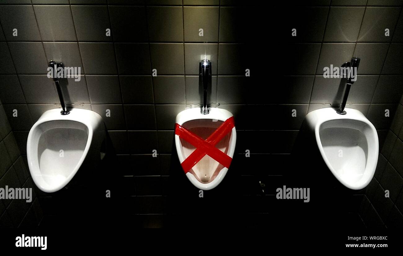 Urinal tape hi-res stock photography and images - Alamy