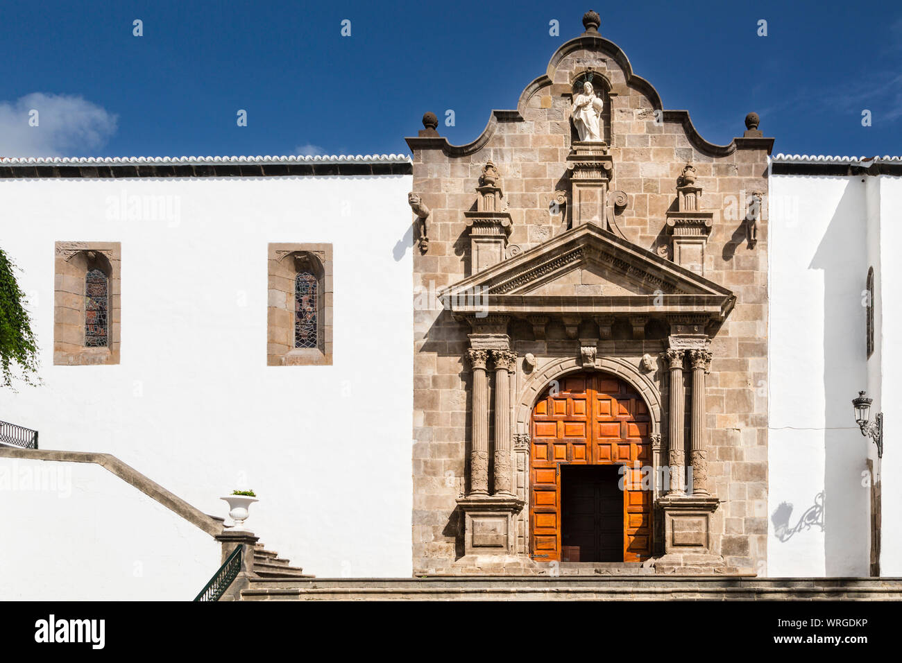 The portal of the church Iglesia Matriz de El Salvador with blue sky in