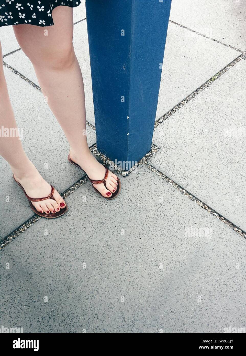 Woman wearing flip flops hi-res stock photography and images - Alamy