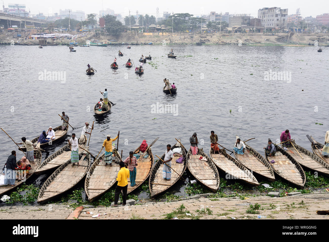 DHAKA, BENGAL BANGLADESH - 28 JANUARY 2019:  Busiest passenger traffic port in Dhaka. Boats for transport the peoples in Sadarghat on the Buriganga Ri Stock Photo