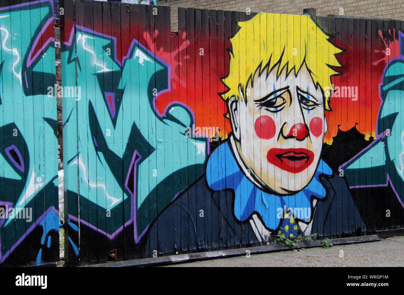 Brick Lane, London, UK - September 10 2019 : Boris Johnson pictured as a Clown by Graffiti artists in East London Stock Photo