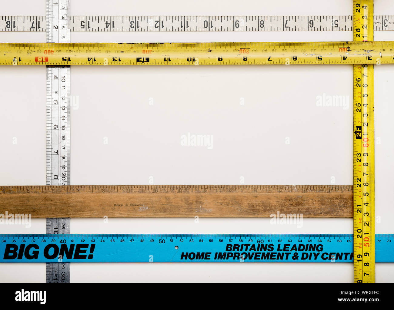 A background arrangement of measurement instruments, rulers and tapes