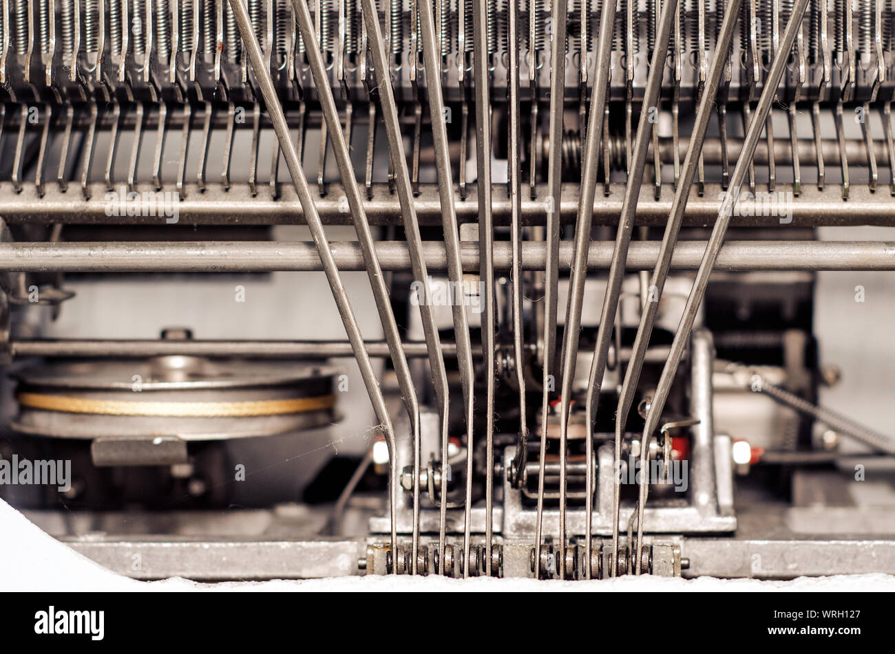 Metal guides, details of a manual typewriter. Vintage, old technology. Stock Photo